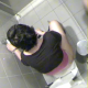An unseen cameraman is a little late in attempting to video record a woman pooping on a toilet, but we get to watch her wipe her ass.